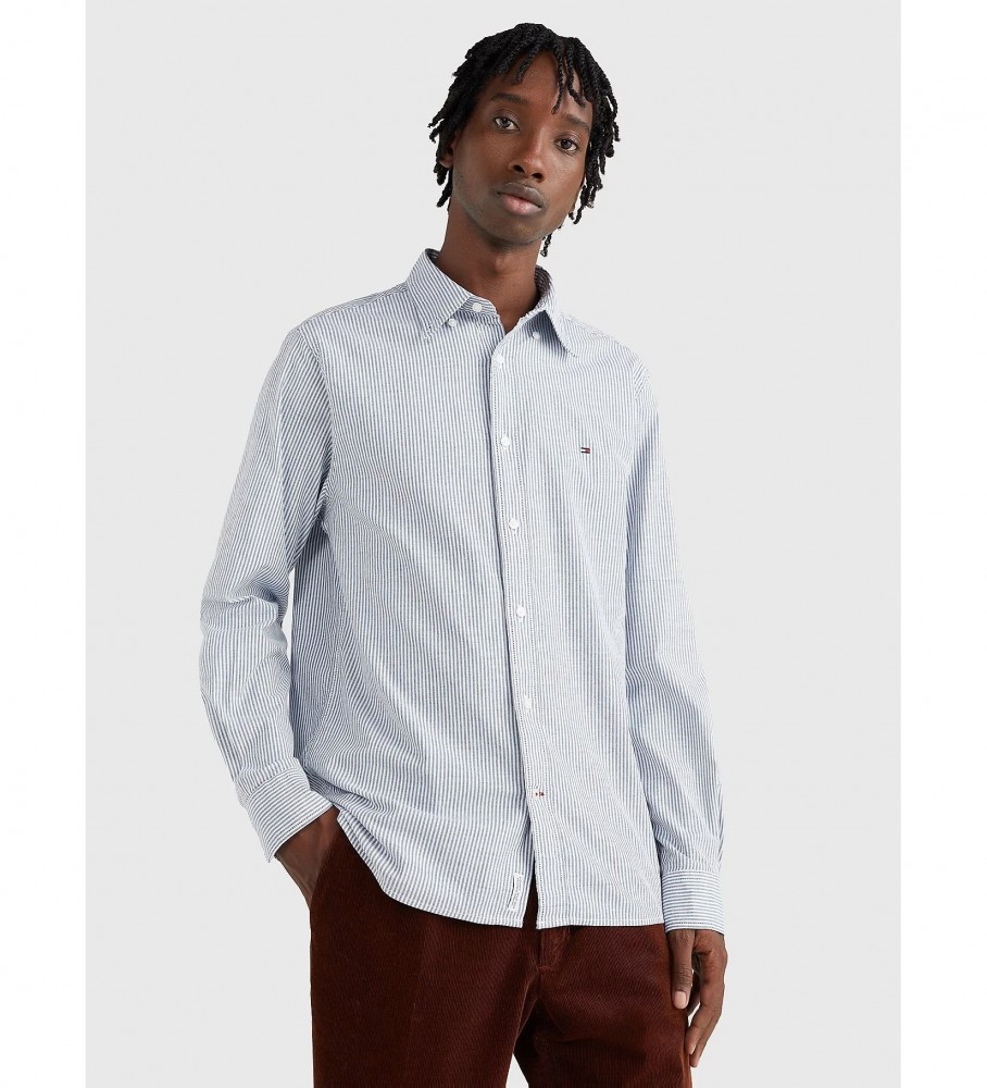 Camisa listrada Tommy Hilfiger TH Flex da coleção 1985, azul.