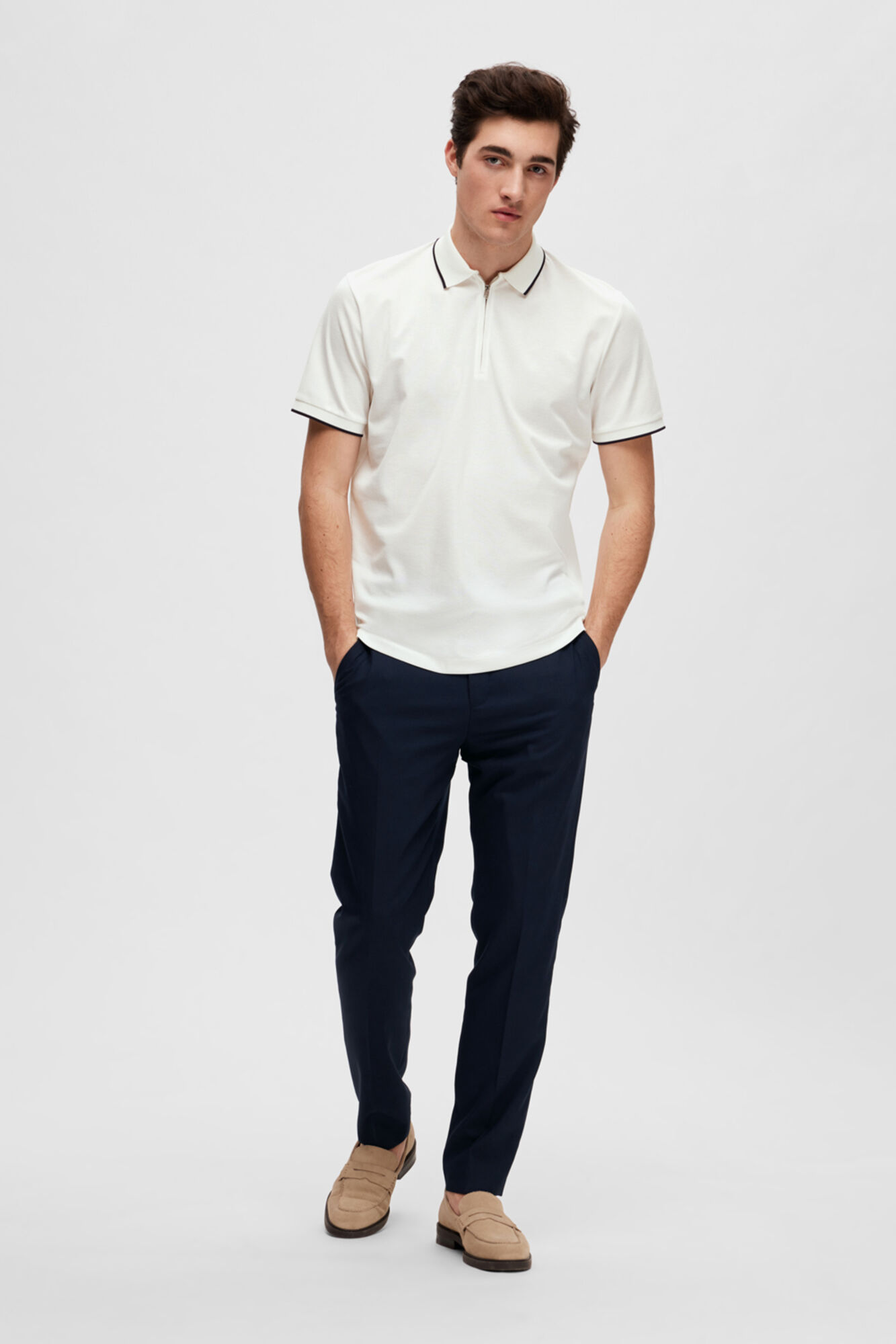 Camisa polo de manga curta com zíper em algodão orgânico. - Branca