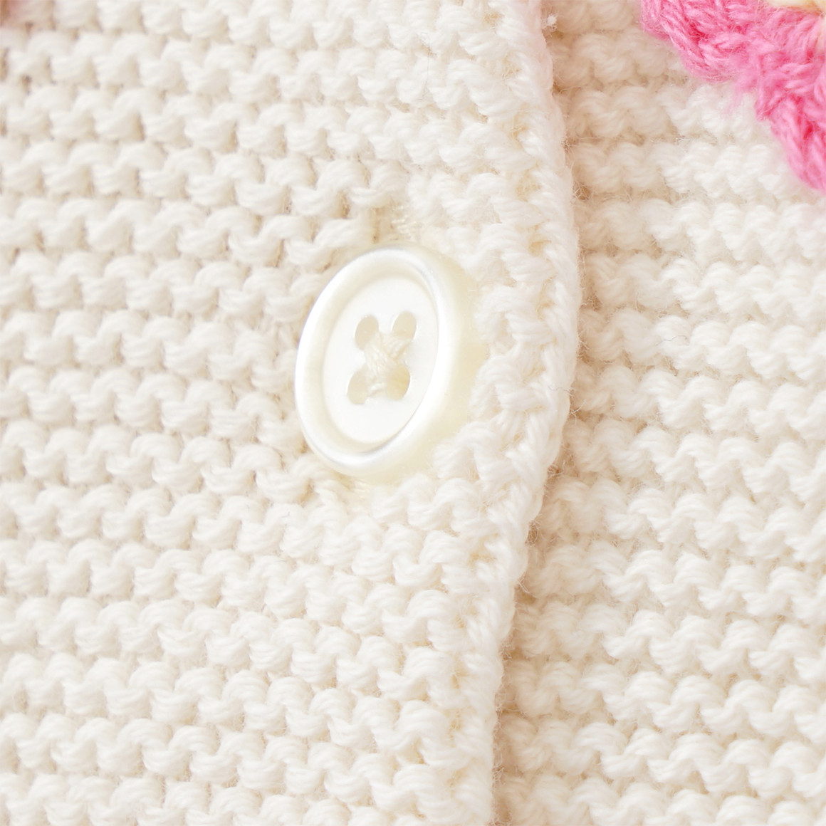 Topomini Baby Strickjacke mit Blumen-Applikation creme