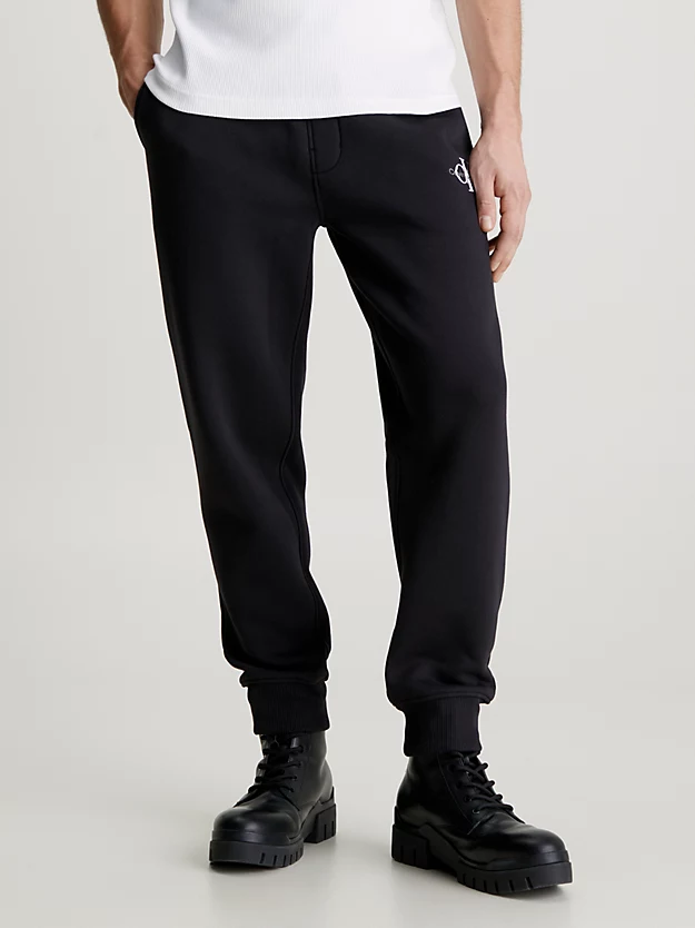 shorts de moletom com monograma