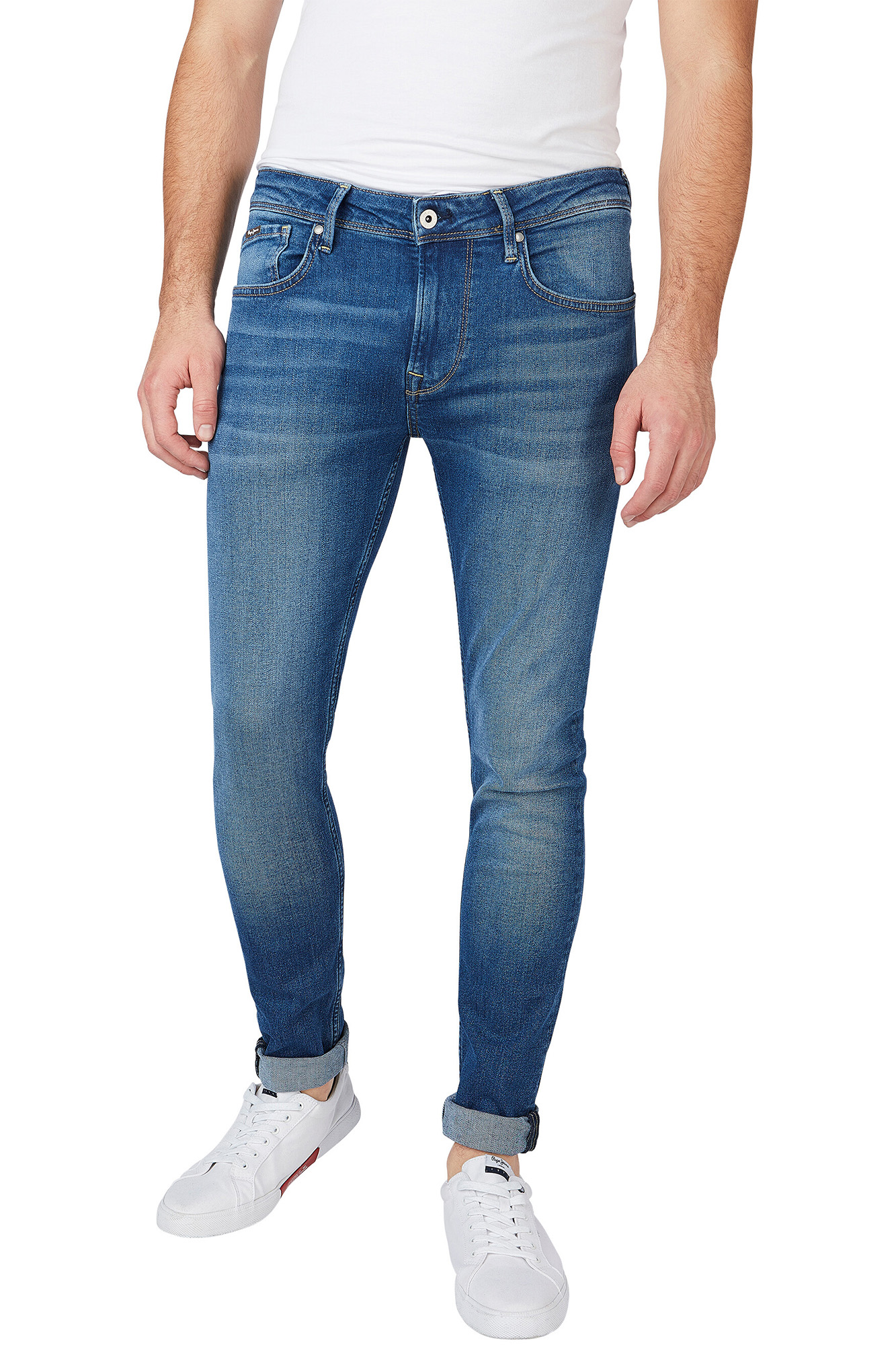 Calça jeans skinny de cintura baixa masculina.