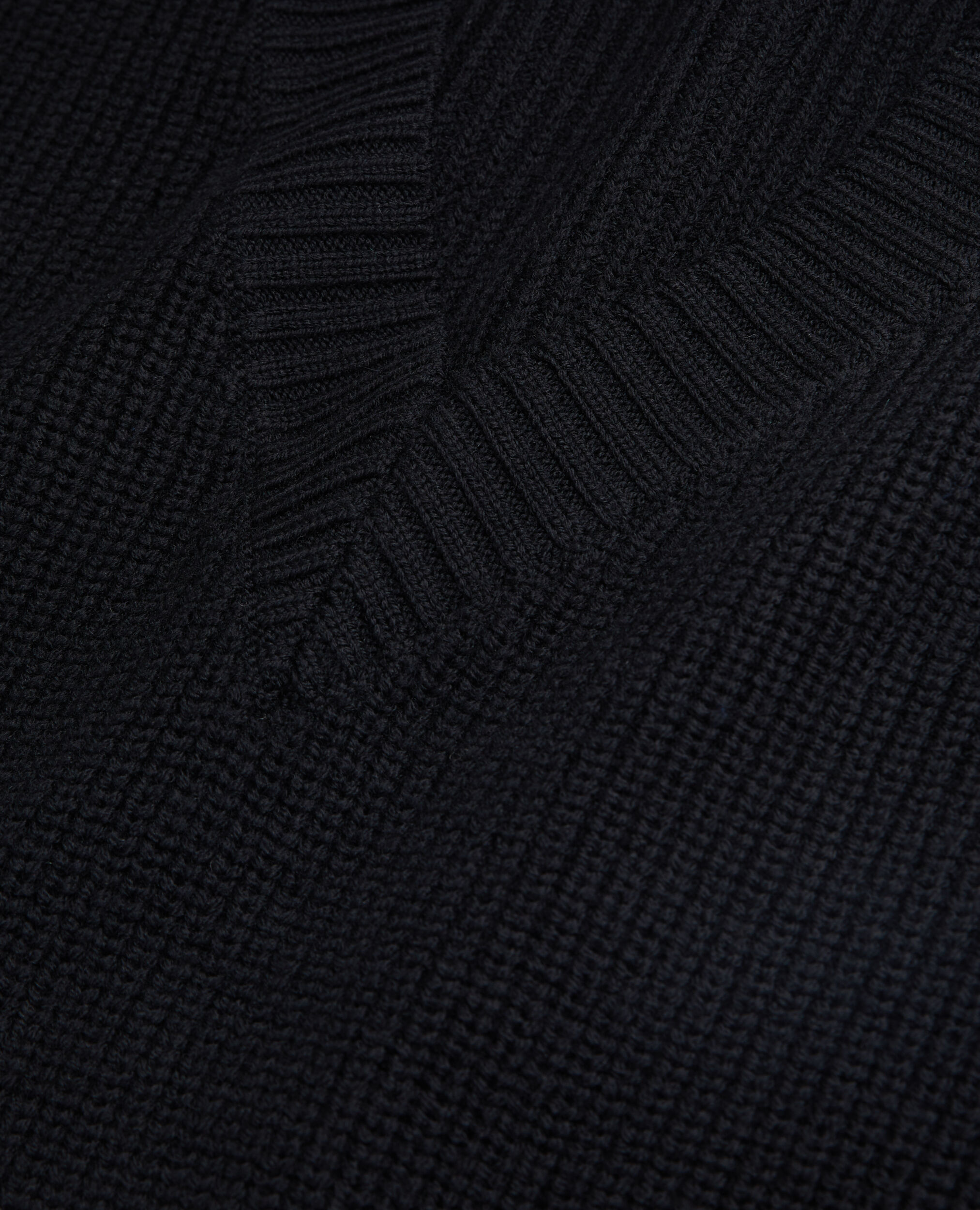 Black sleeveless wool sweater