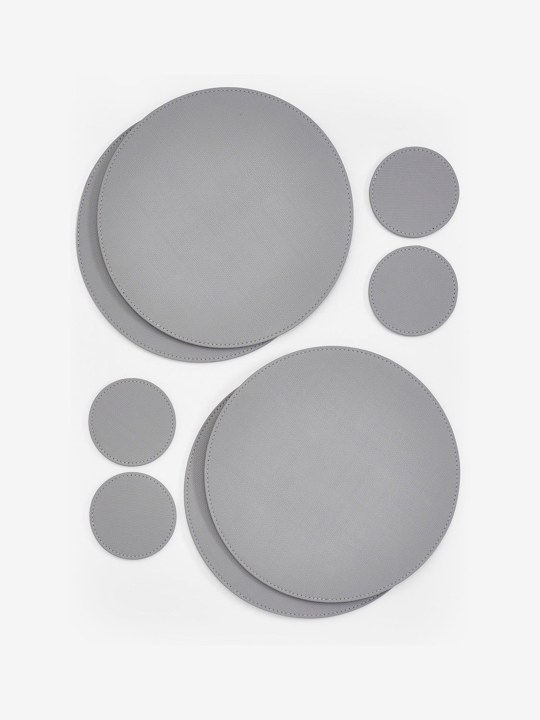 Set van 4 omkeerbare placemats en onderzetters van imitatieleer