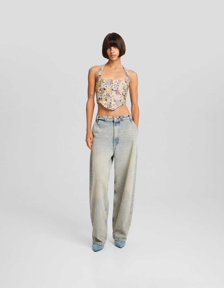 Blusa aberta nas costas com amarração em jacquard