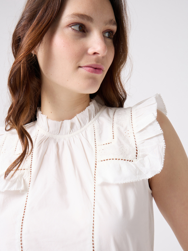 Blouse brodée sans manche