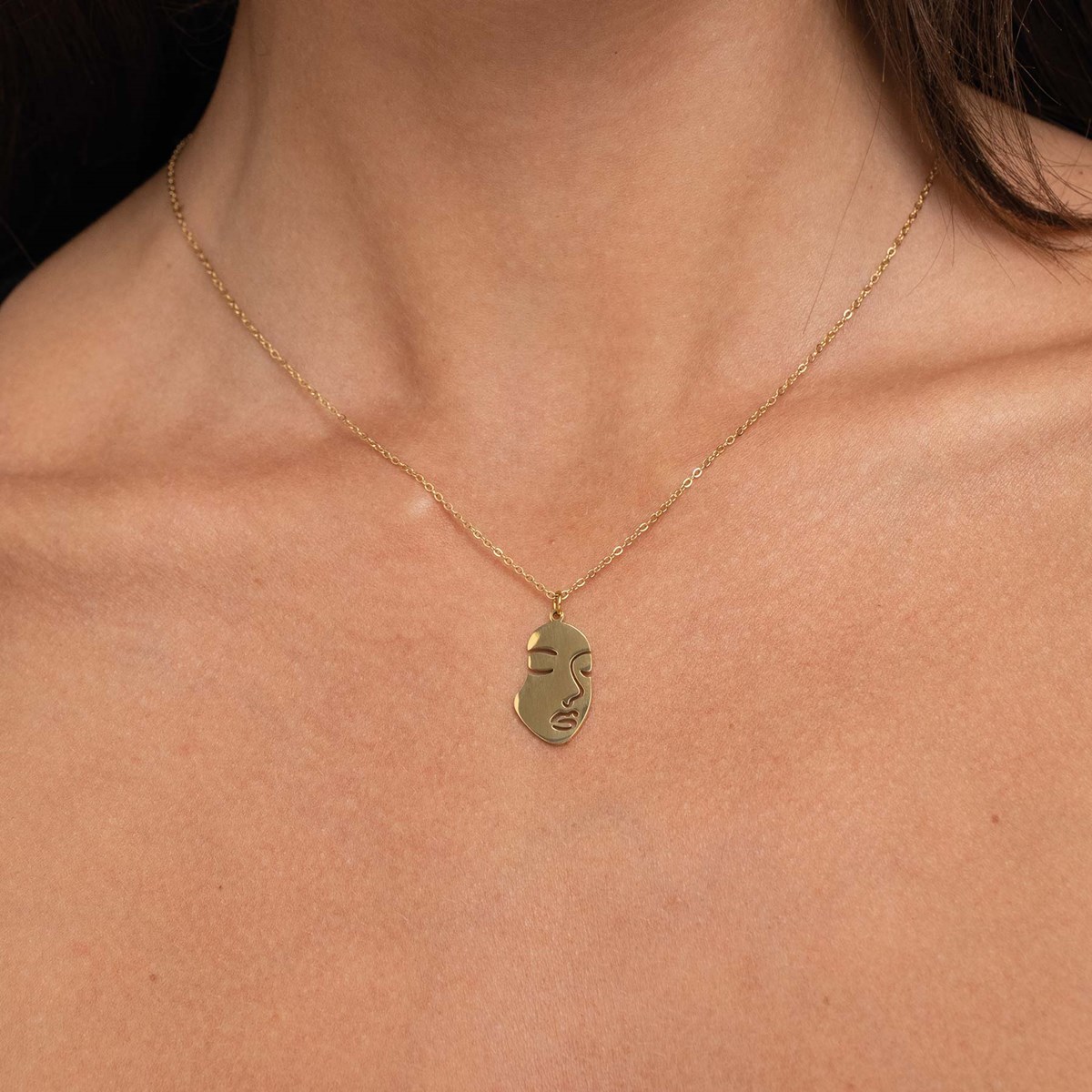 Collier Visage acier doré or