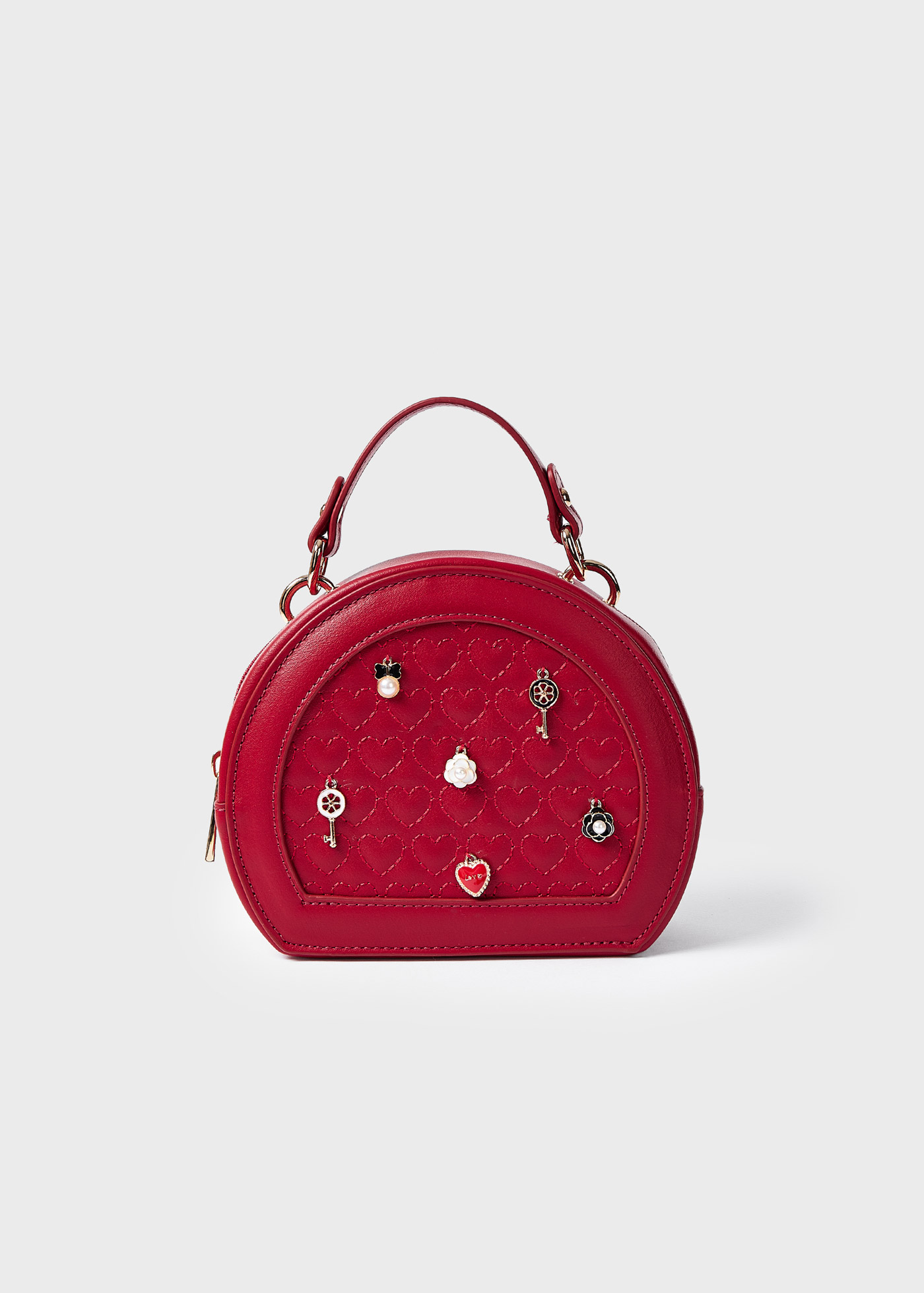 Bolsa com efeito acolchoado e detalhes decorativos para meninas