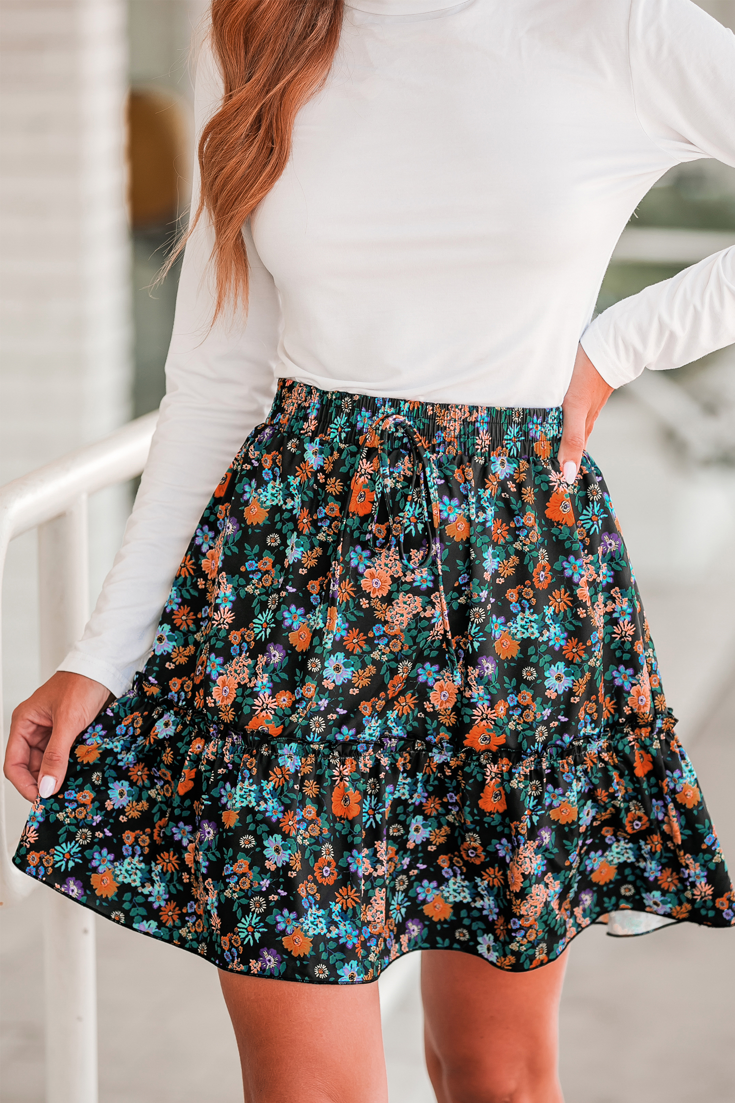 Jupe mini à cordon et imprimé floral
