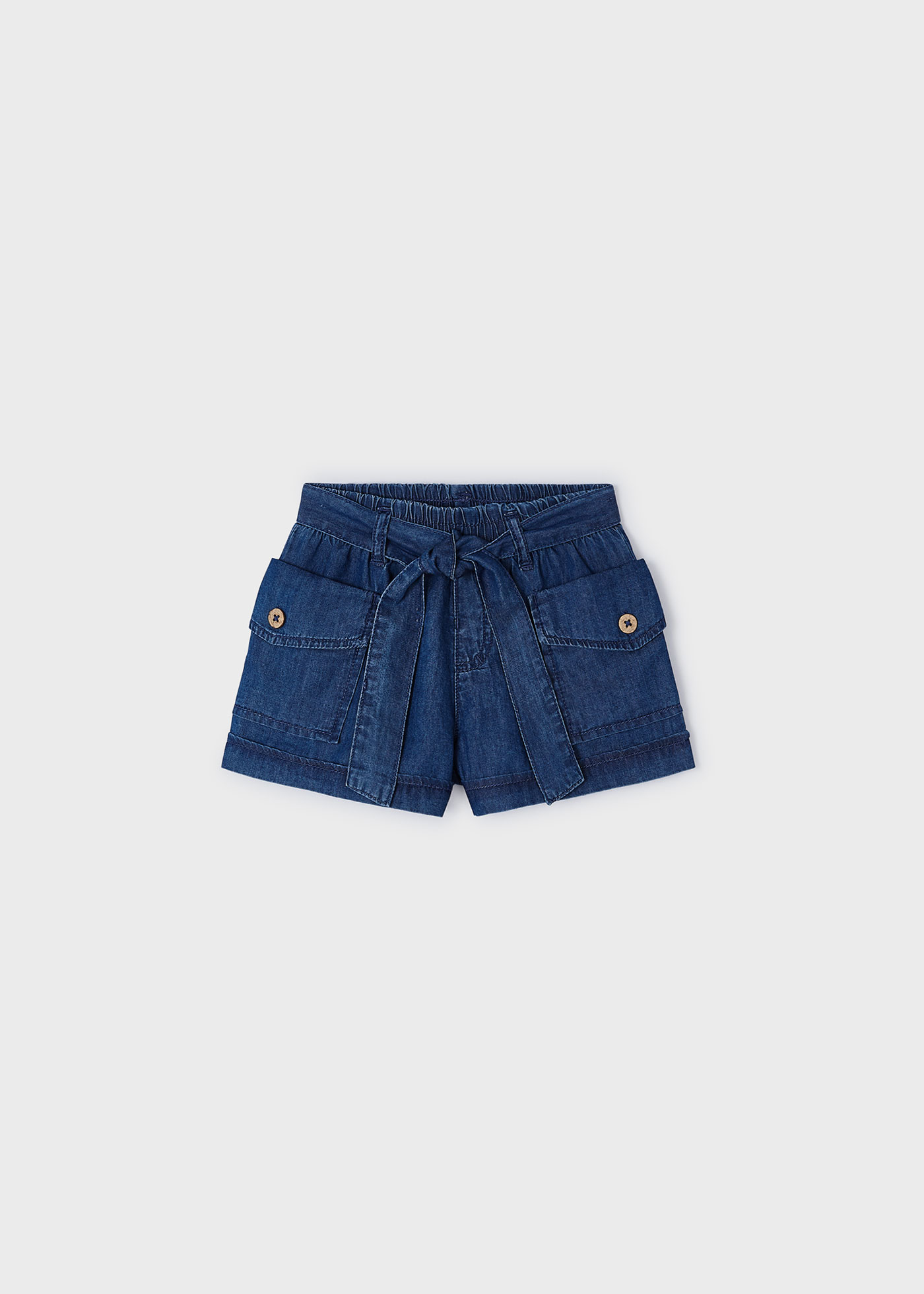 Calções para menina com bolsos, em ganga escura.