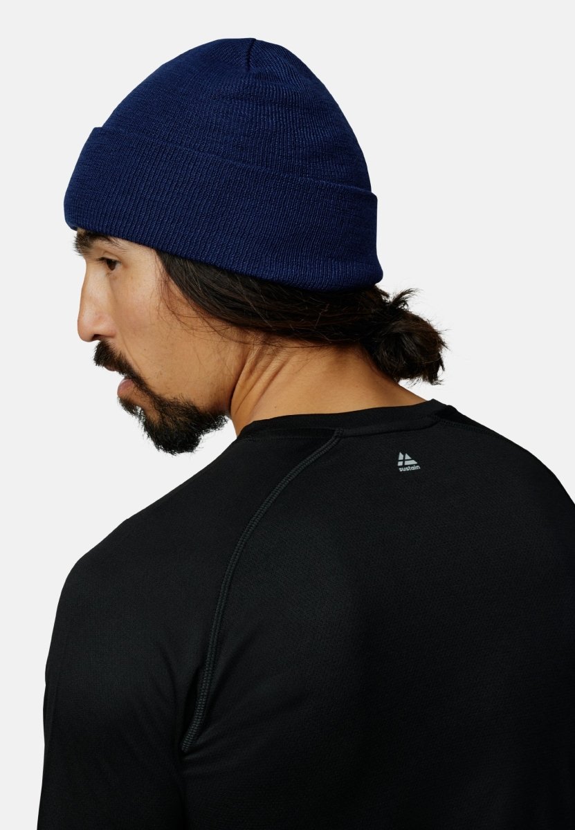 HUE MED FLEECE AF GENANVENDTE MATERIALER