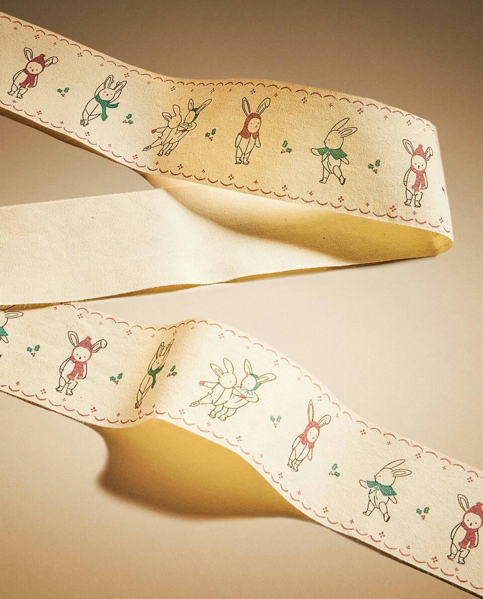 Papel de embrulho infantil com coelhinhos de Natal