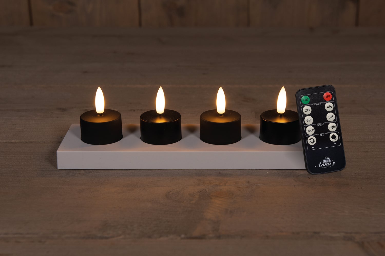 Anna's Collection LED waxinelicht met afstandsbediening zwart D 3,8 H 5 cm 4 stuks