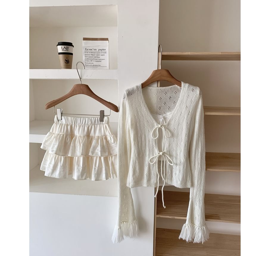 Dute - V-hals effen franje pointelle cardigan met strik aan de voorkant