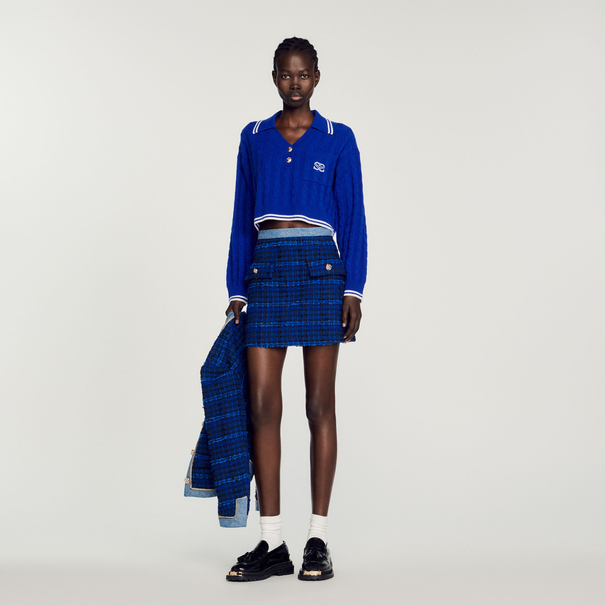 Pull court en maille torsadee