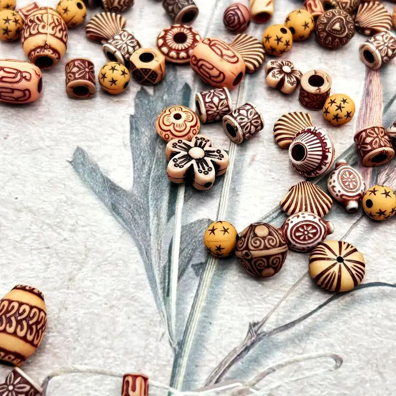 (100er Set) Holz Ornament Perlen DIY Bastel Schmuck Zwischenperle für Armband / Kette - Assortiert