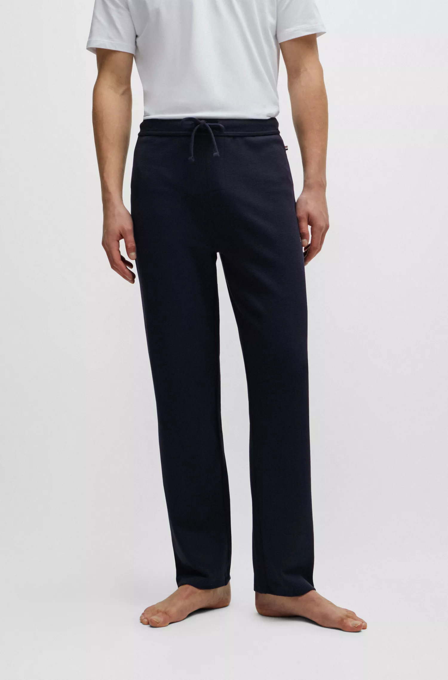 Calça de pijama BOSS em mistura de algodão preto com logotipo bordado.