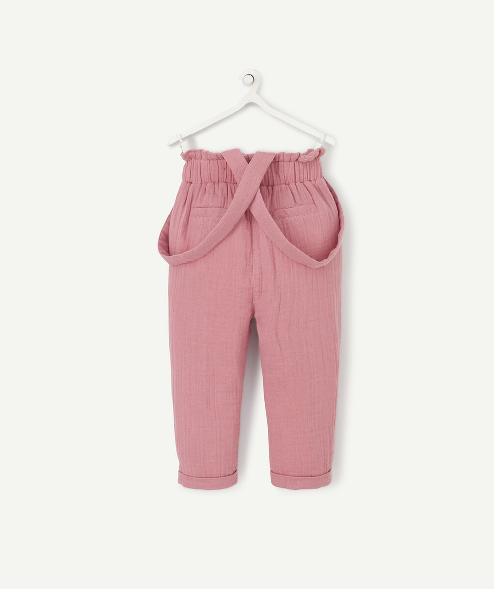 LE PANTALON ROSE EN COTON AUX BRETELLES AMOVIBLES ET FLEURS