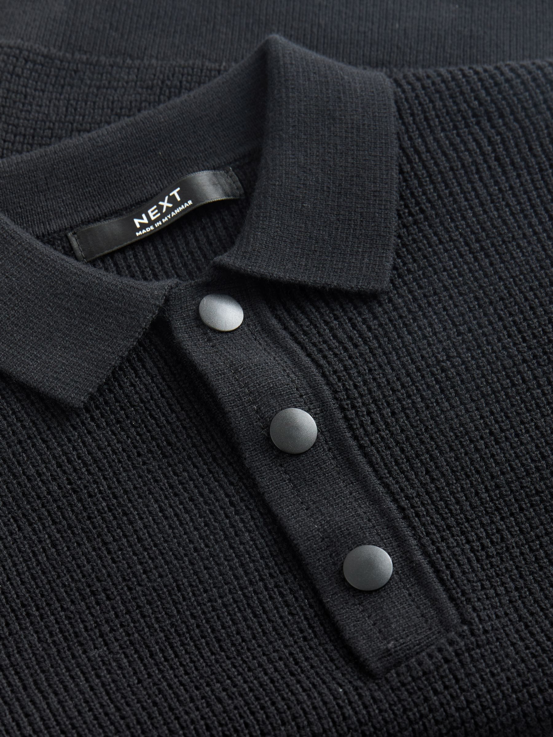 Zwart - Poloshirt met textuur en lange mouwen (3-16jr)