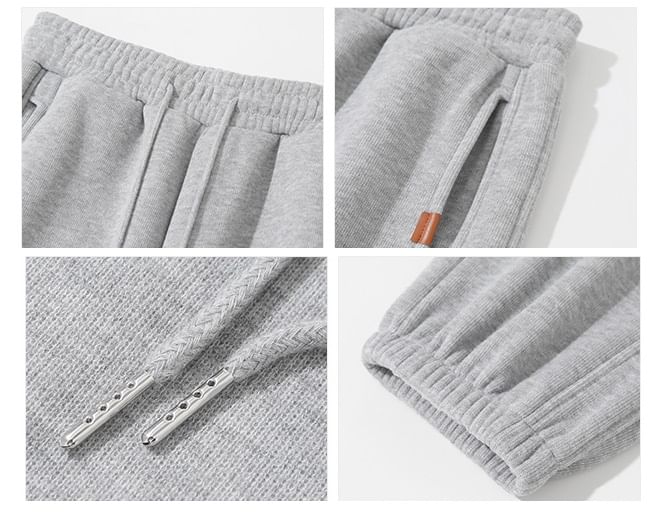 evanesce - Effen joggingbroek met hoge taille, wijde pijpen en chenillevoering
