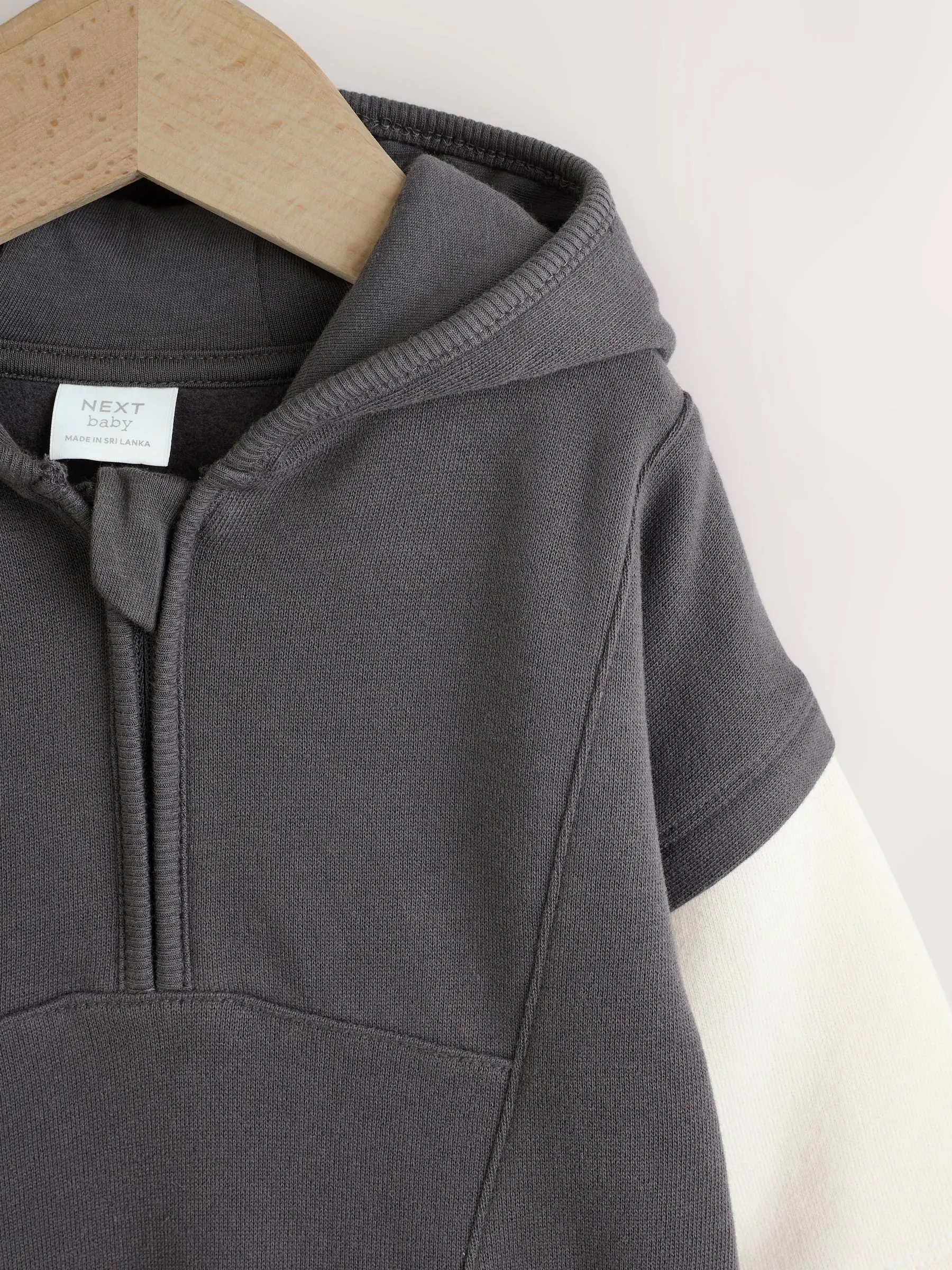 Monochroom - Babyromper met capuchon (0mnd-3jr)