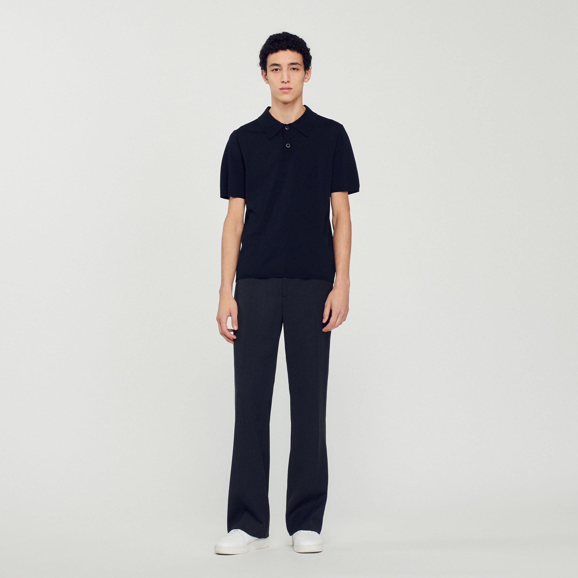 Polo en maille á manches courtes