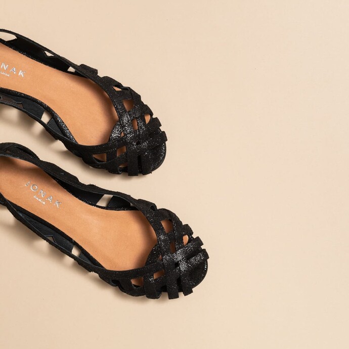 Ballerines ajourées en croûte  laminée noire