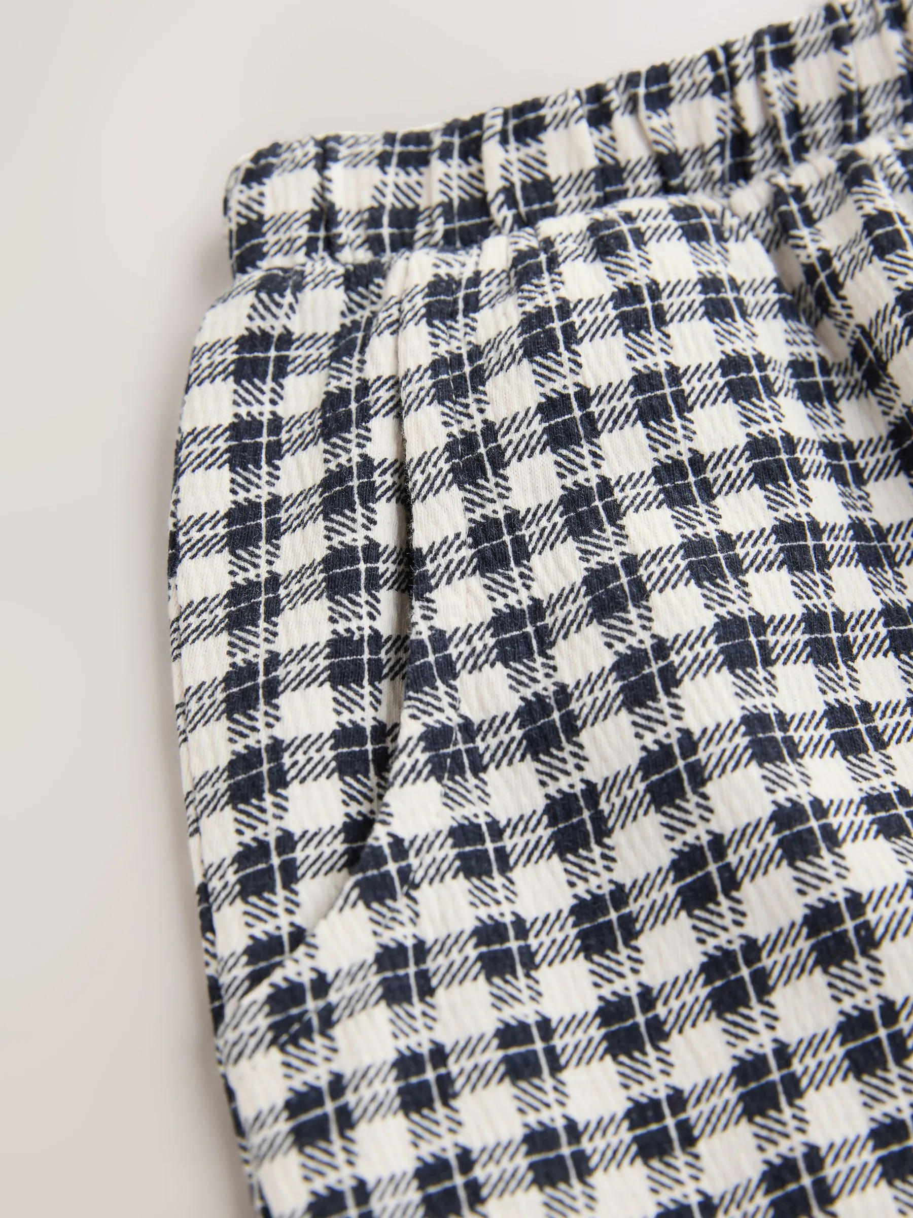Zwarte/witte gingham-ruit - Broek met structuur en wijde kortere pijpen (3mnd -7jr)
