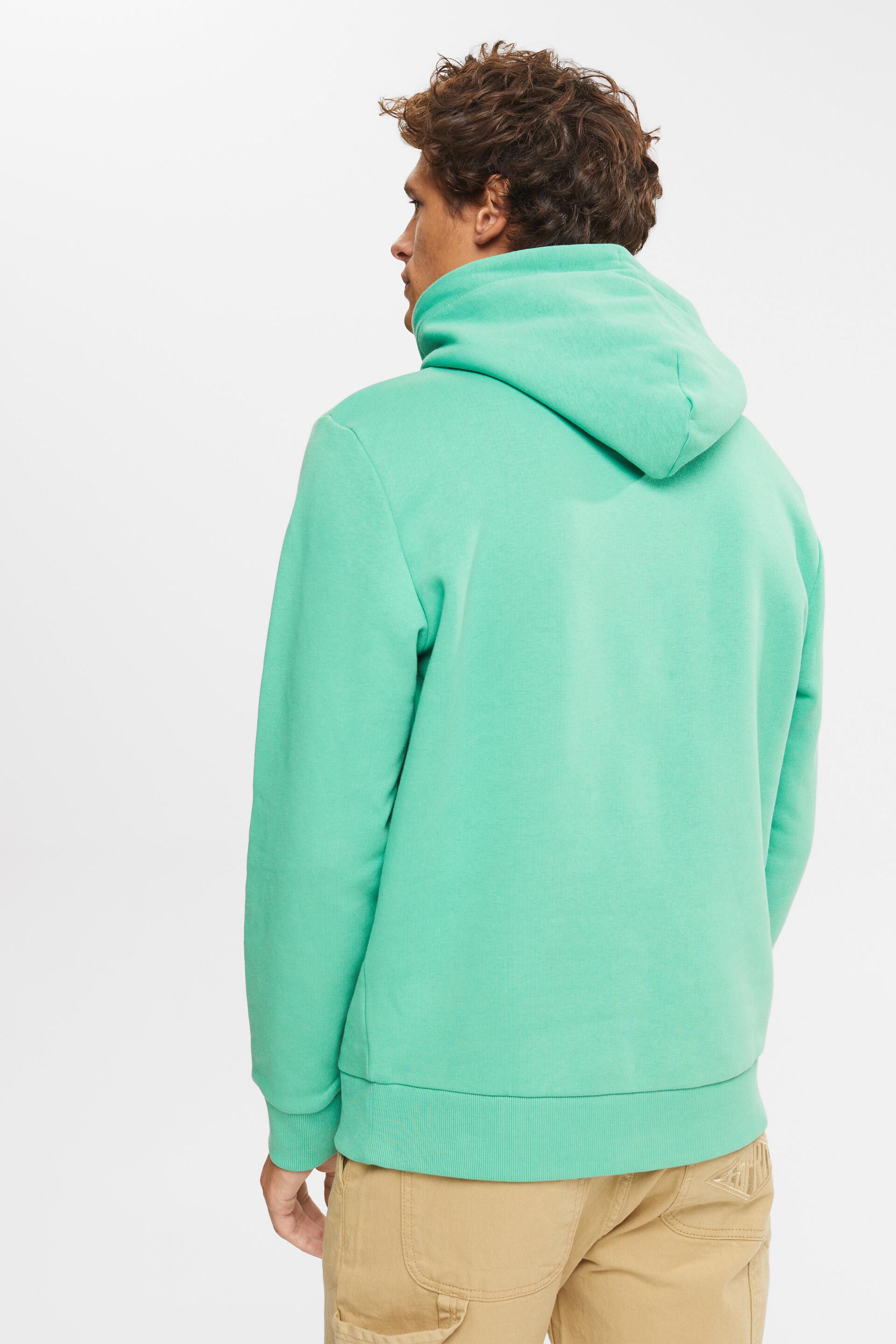 En matière recyclée : le sweat à capuche à logo brodé
