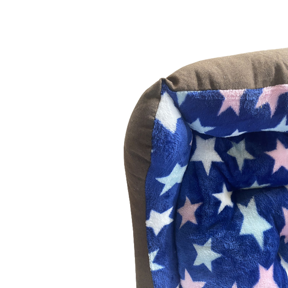Cama retangular para animais de estimação com forro de pelúcia. Design de estrela.