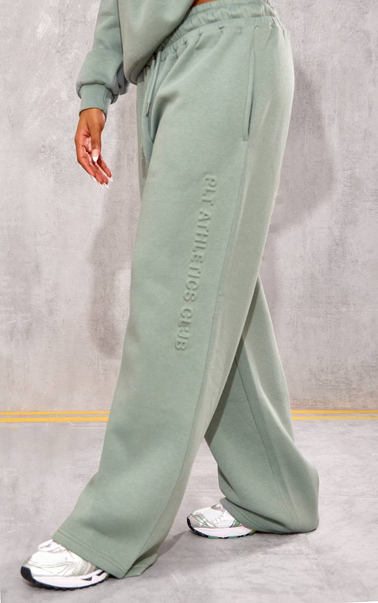 Vert Sauge Prettylittlething Jogging Jambes Droites Gaufré Athletics Club