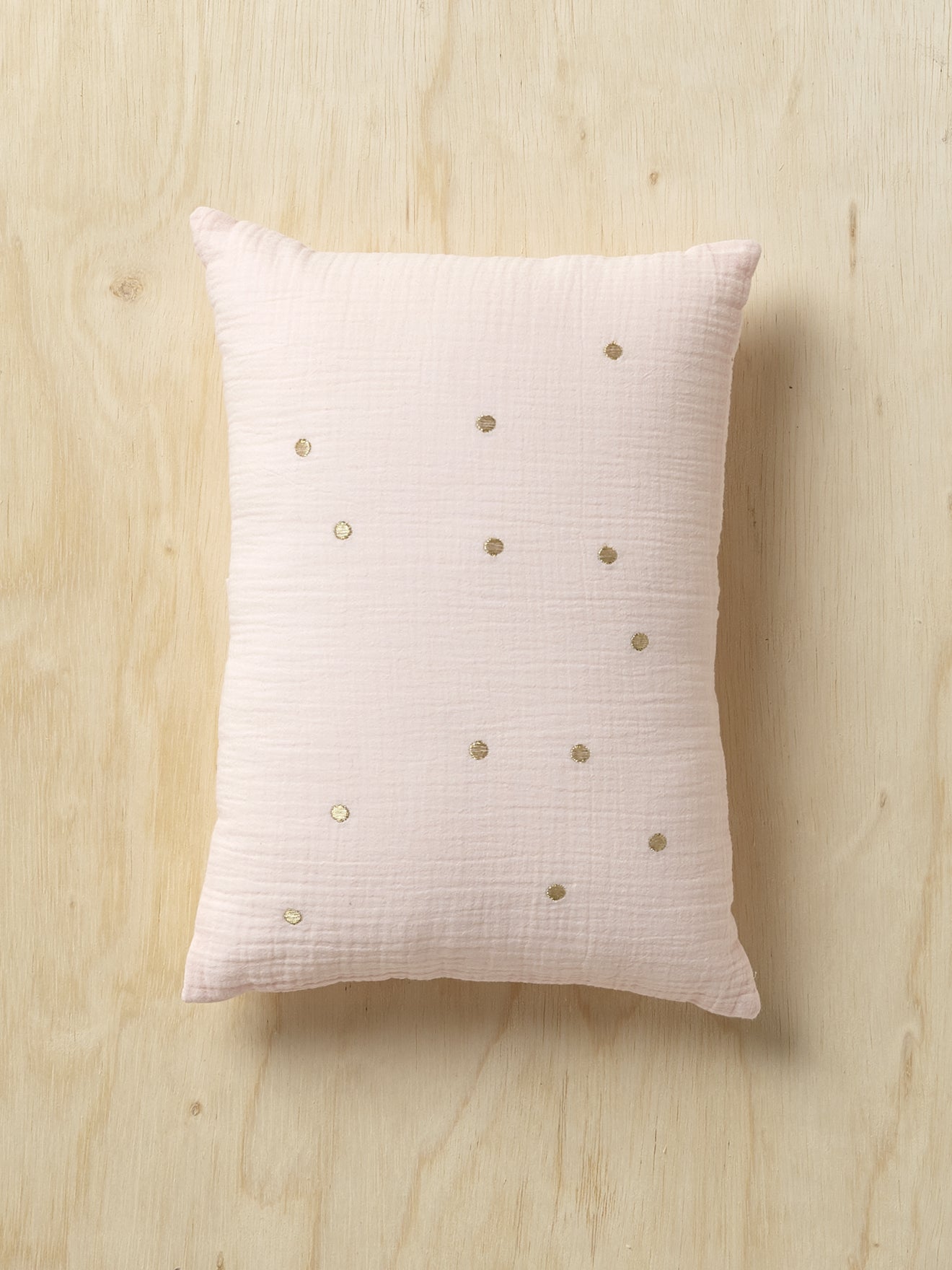 Coussin gaufré à pois brodés