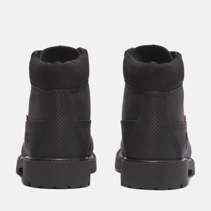 Bota Timberland Premium Helcor de 6 polegadas para jovens na cor preta.