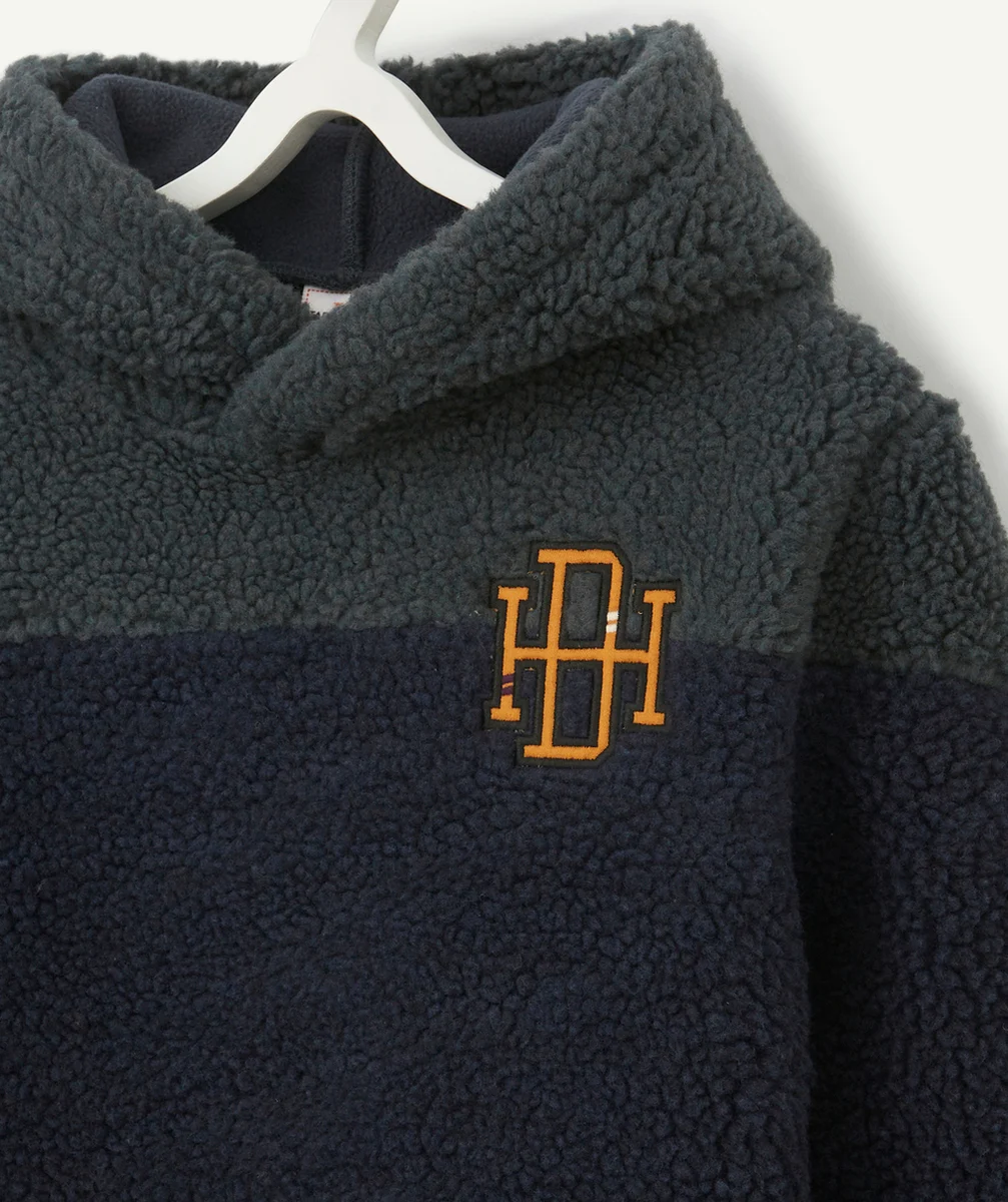 SWEAT À CAPUCHE EN SHERPA BLEU MARINE ET VERT GARÇON