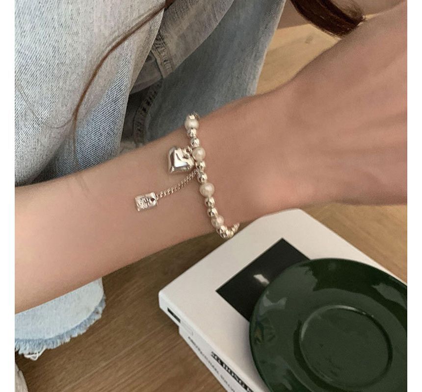 Catharsis - Hartvormige armband van imitatieparels