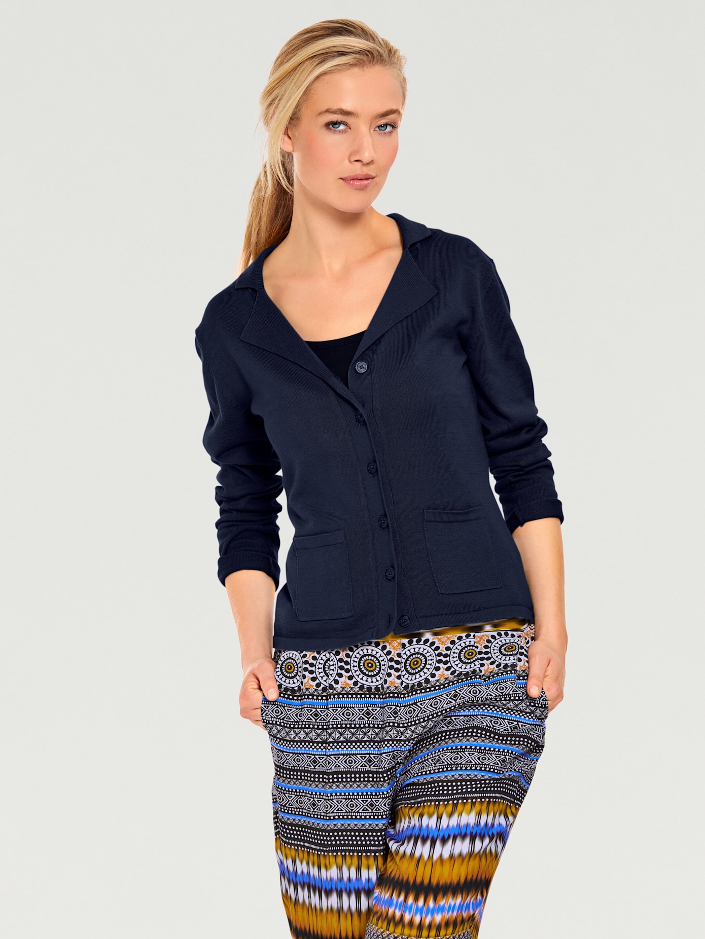 Veste en tricot fin superbe basique avec poches plaquées