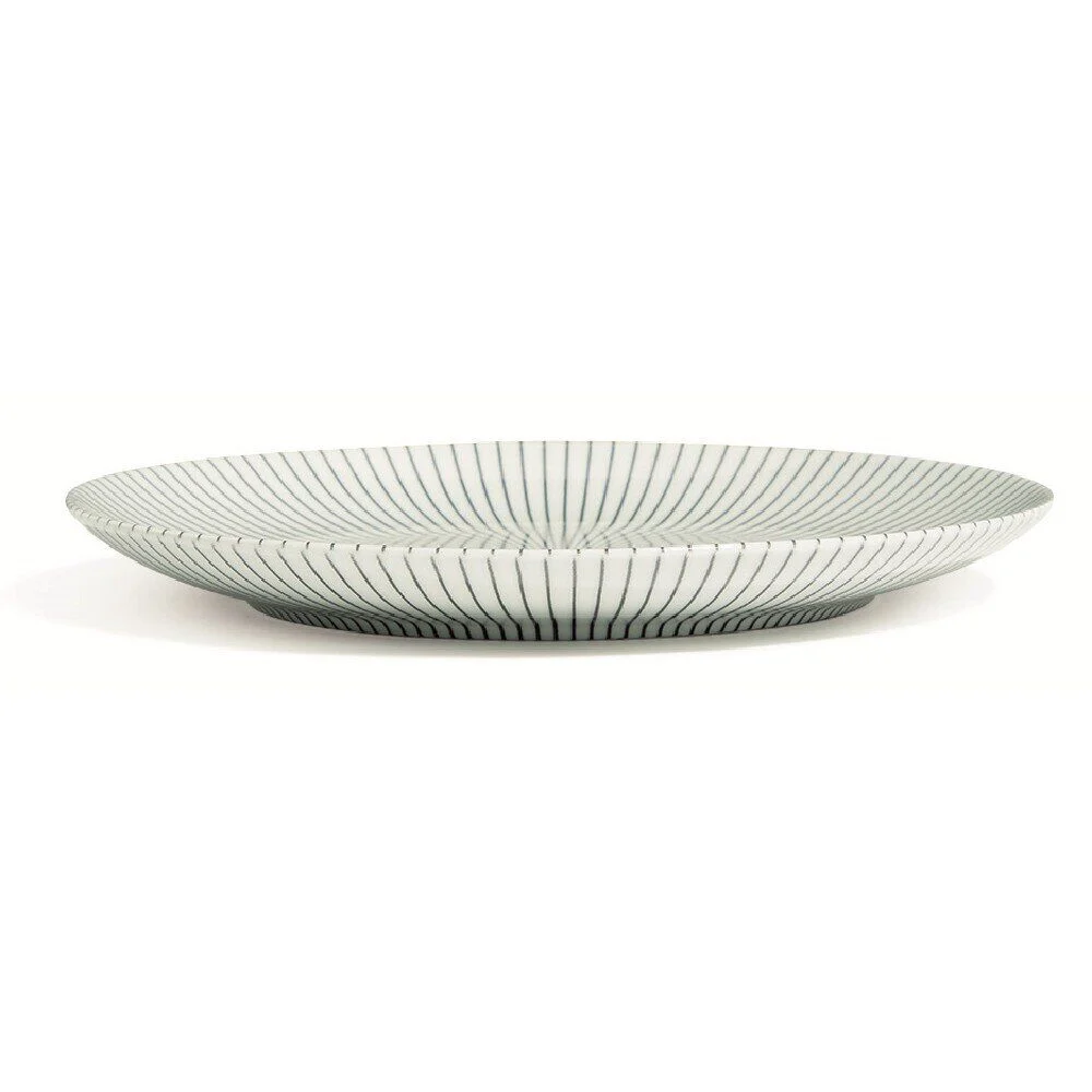 Assiette plate en porcelaine décor rayures soleil