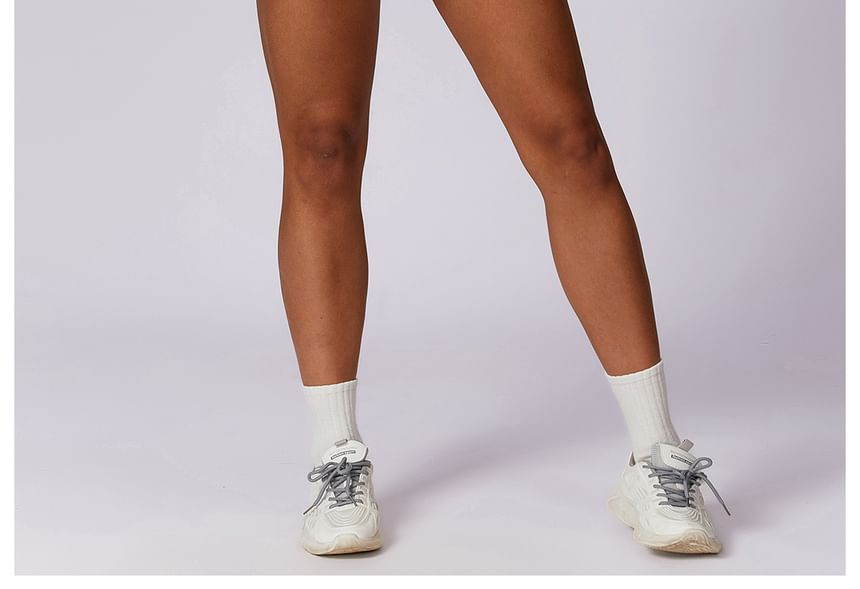 Skinniano - Sport tanktop met kraag en effen cropped pasvorm