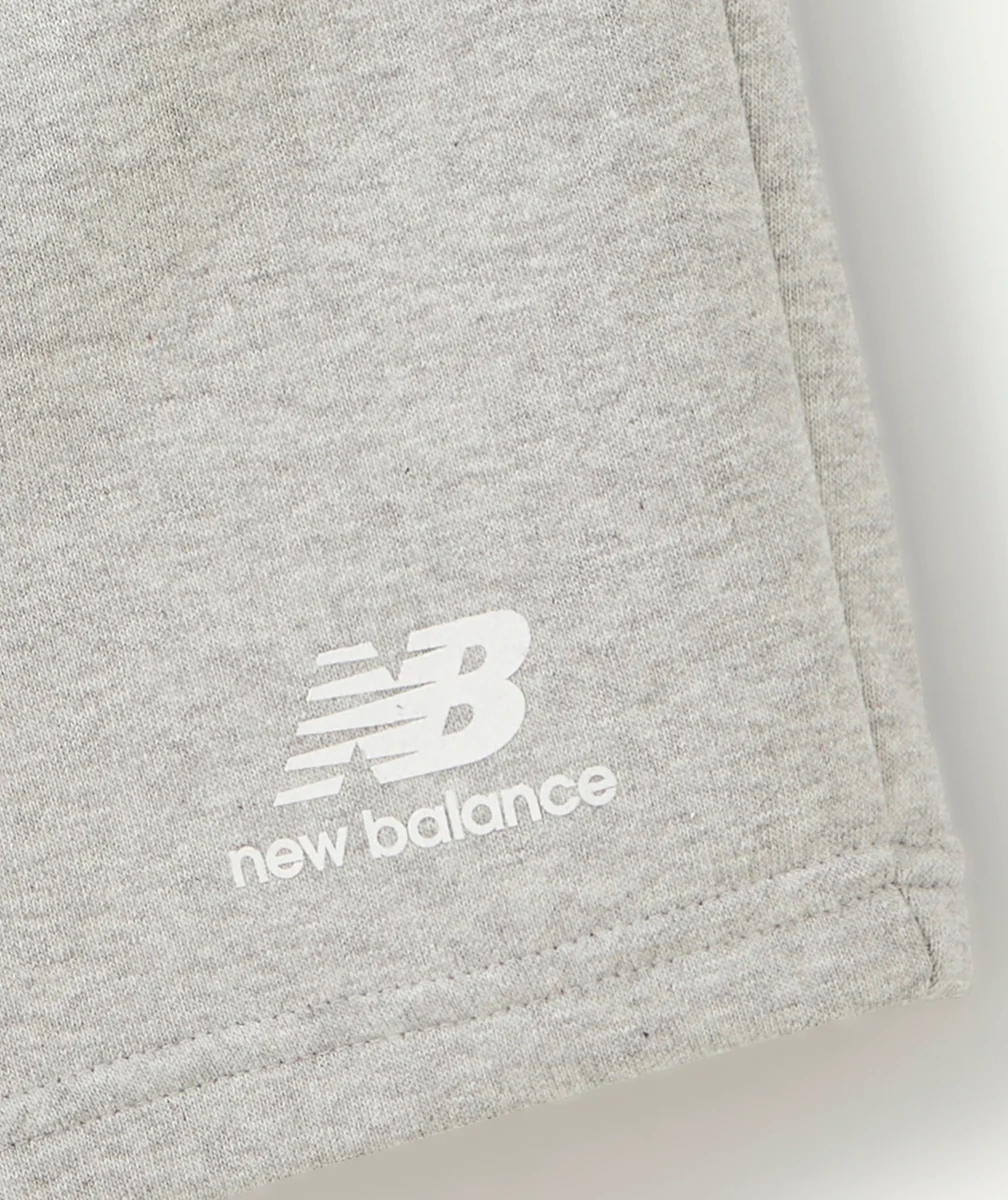 NEW BALANCESHORT ESSENTIALS STACKED GARÇON GRIS