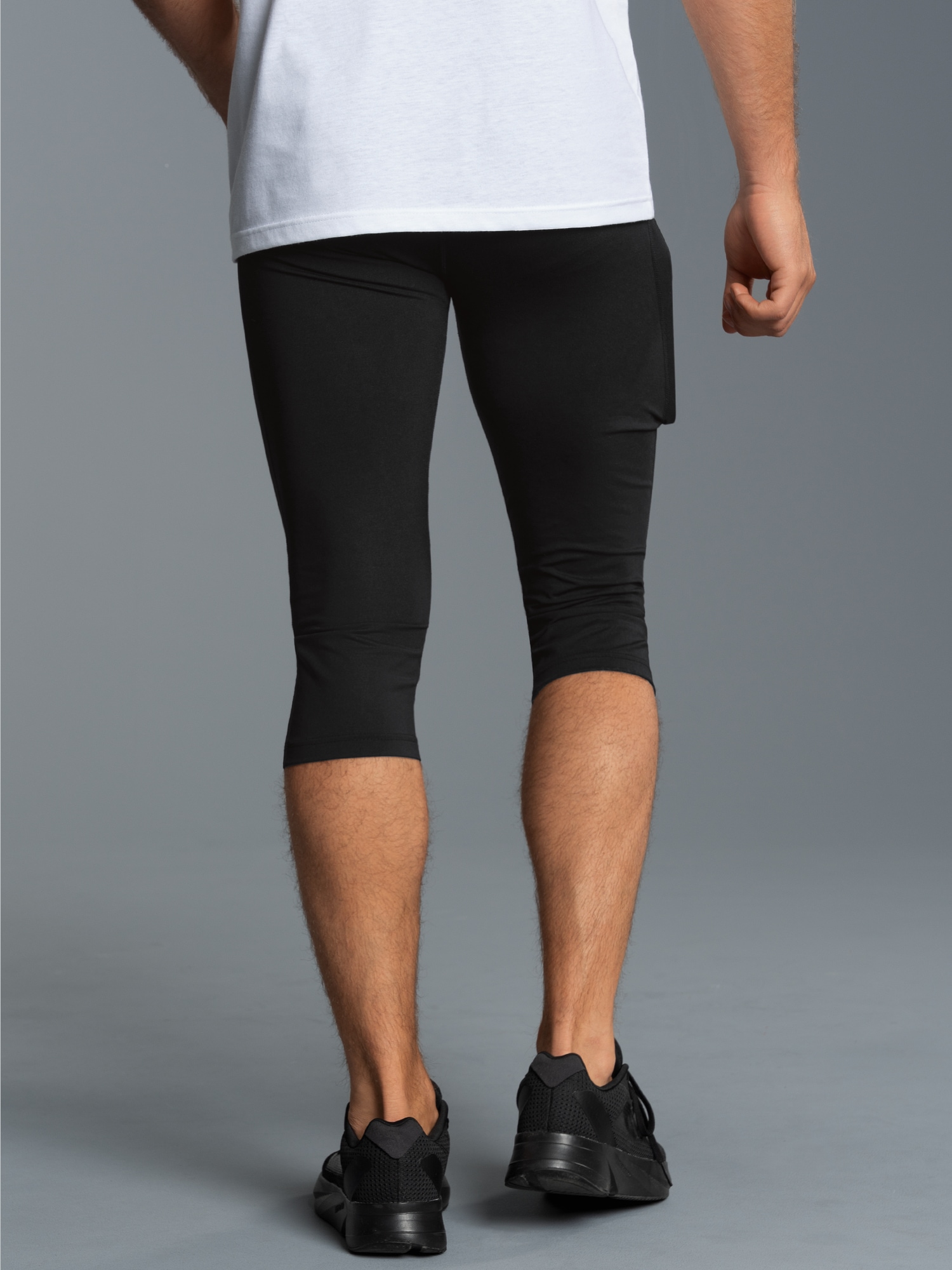 Kurze Sportleggings mit SeitentascheSchwarz