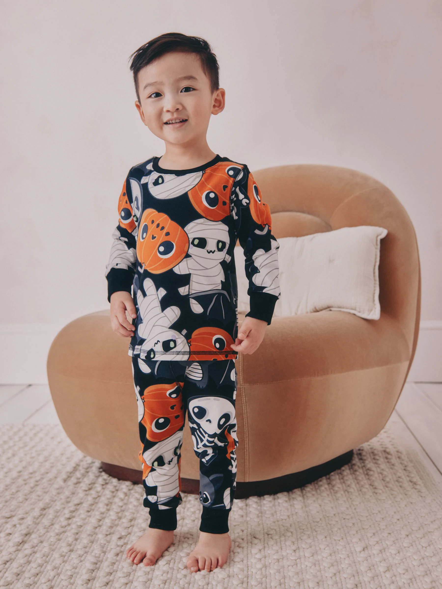 Zwart - Nauwsluitende enkele knuffelpyjama (9mnd -10jr)