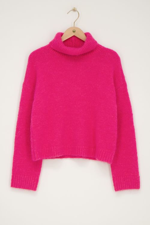Roze wijde trui met turtleneck