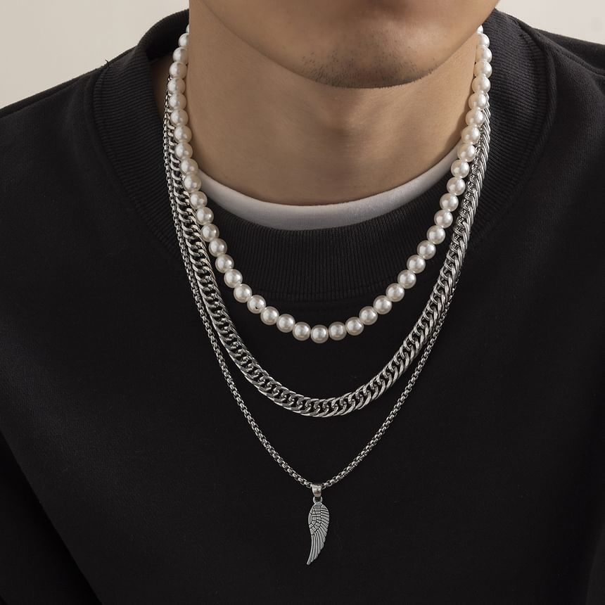 Gretlyn - Set: Kunstparelketting + Ketting + Vleugelhangerketting