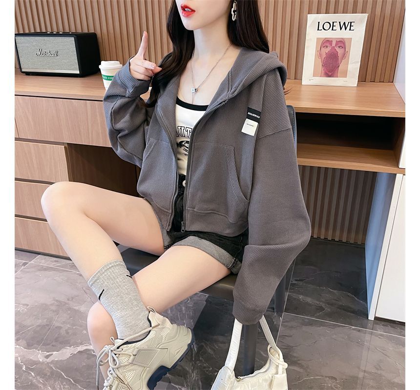 Jewie - Hoodie met rits en letters