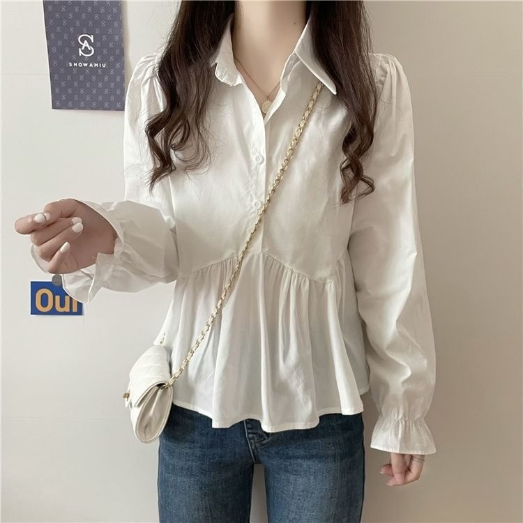 Sisyphi - Blouse met pofmouwen en knoopjes