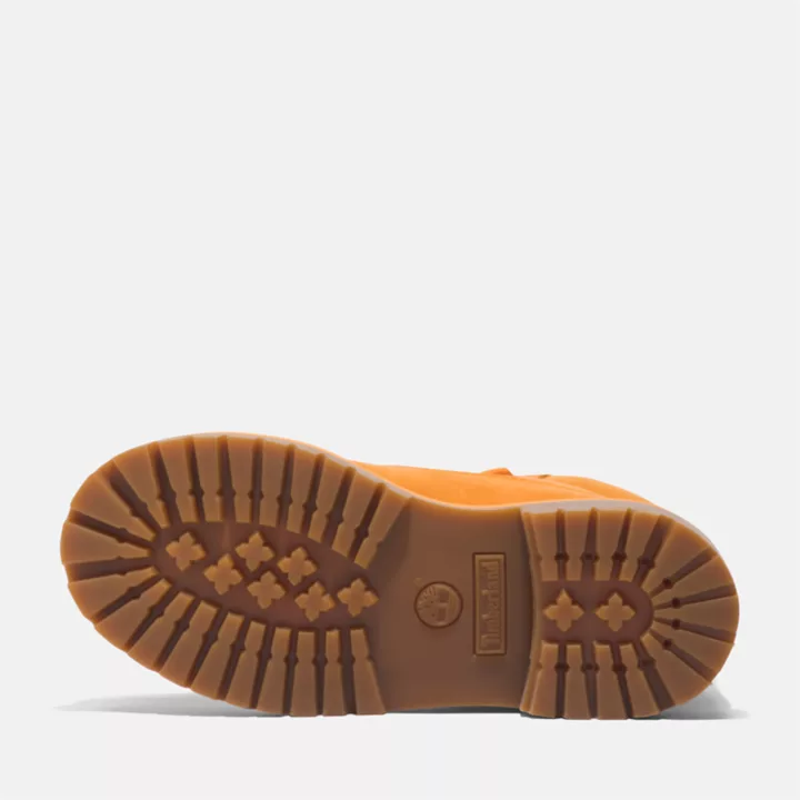 Bota Timberland Premium de 6 polegadas impermeável, edição especial 50, para crianças, na cor laranja.