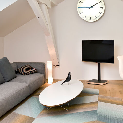 Bülow Stand BS15CO – exclusieve TV-vloerstandaard met verborgen wielen Zwart