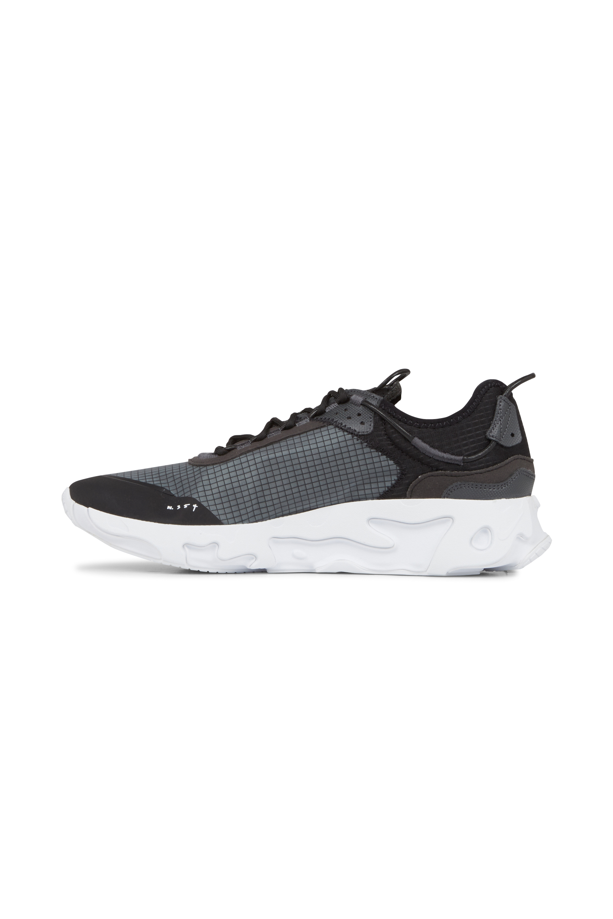 NIKE Baskets basses en toile REACT LIVE Noir