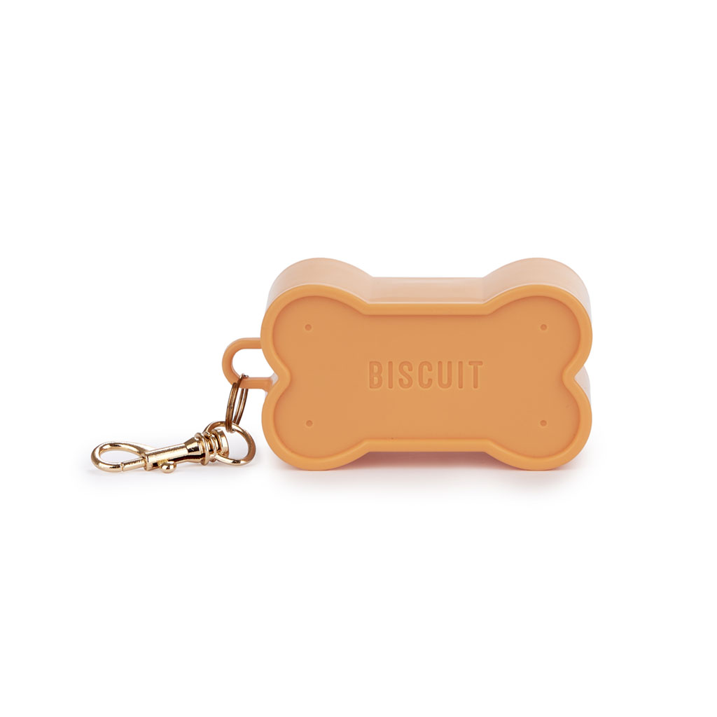 Dispensador de sacos para dejetos de cachorro Balvi Biscuit, laranja, para passeios com seu pet, em formato de biscoito, de plástico.