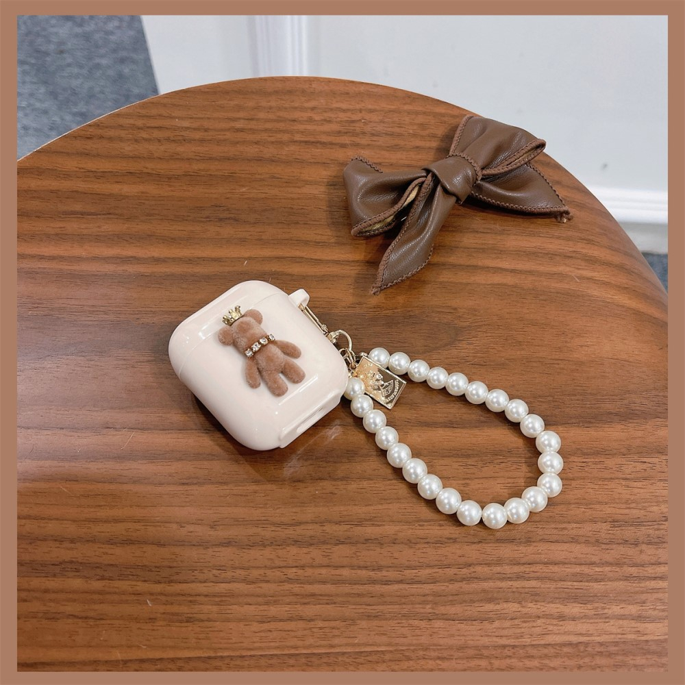 AirPods (1. & 2. Generation) Gummi Case Schutzhülle mit Handschlaufe Bär mit Krone Design - Beige