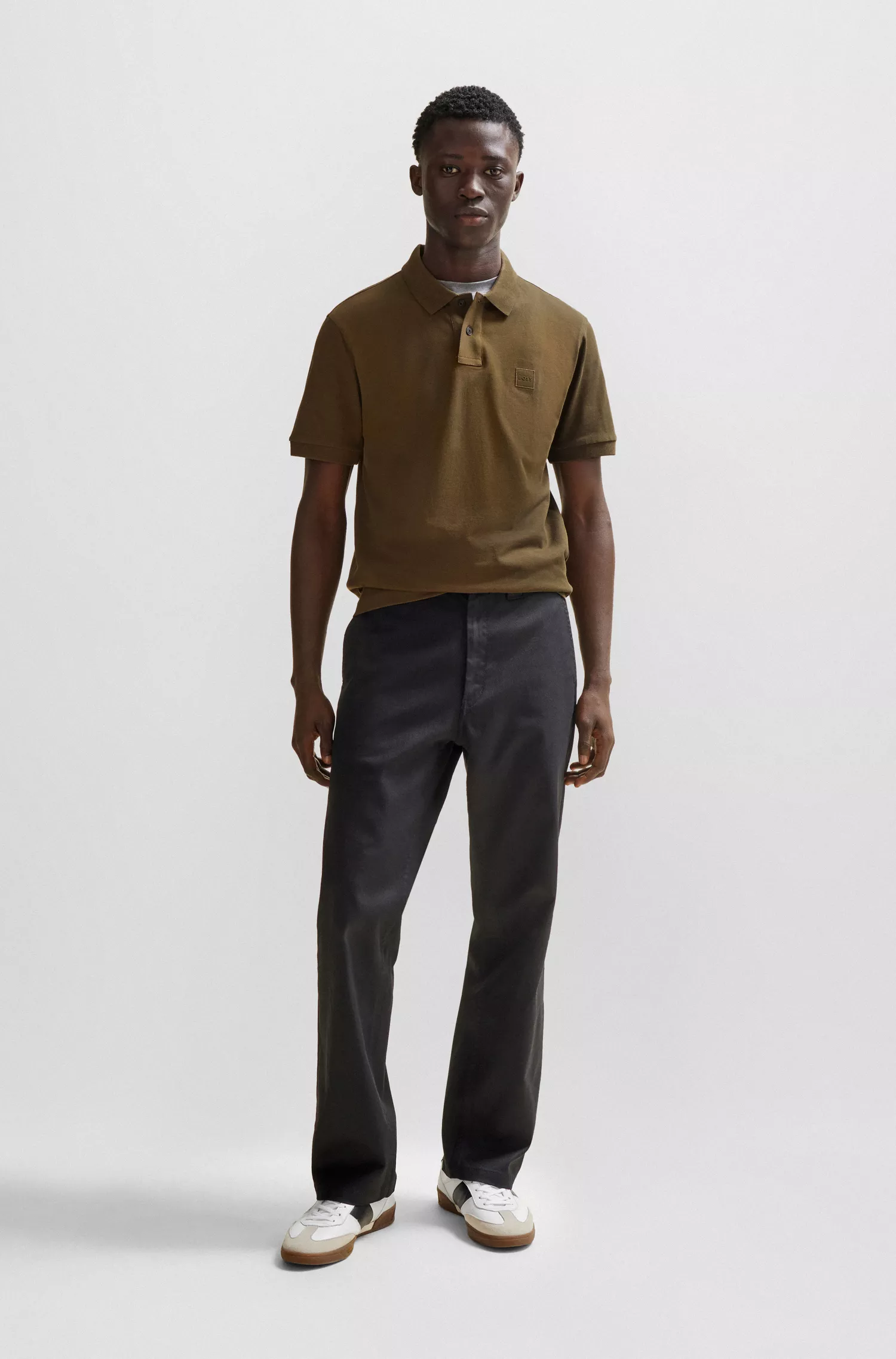 Camisa polo BOSS laranja, de algodão stretch, corte slim, com etiqueta de logotipo.